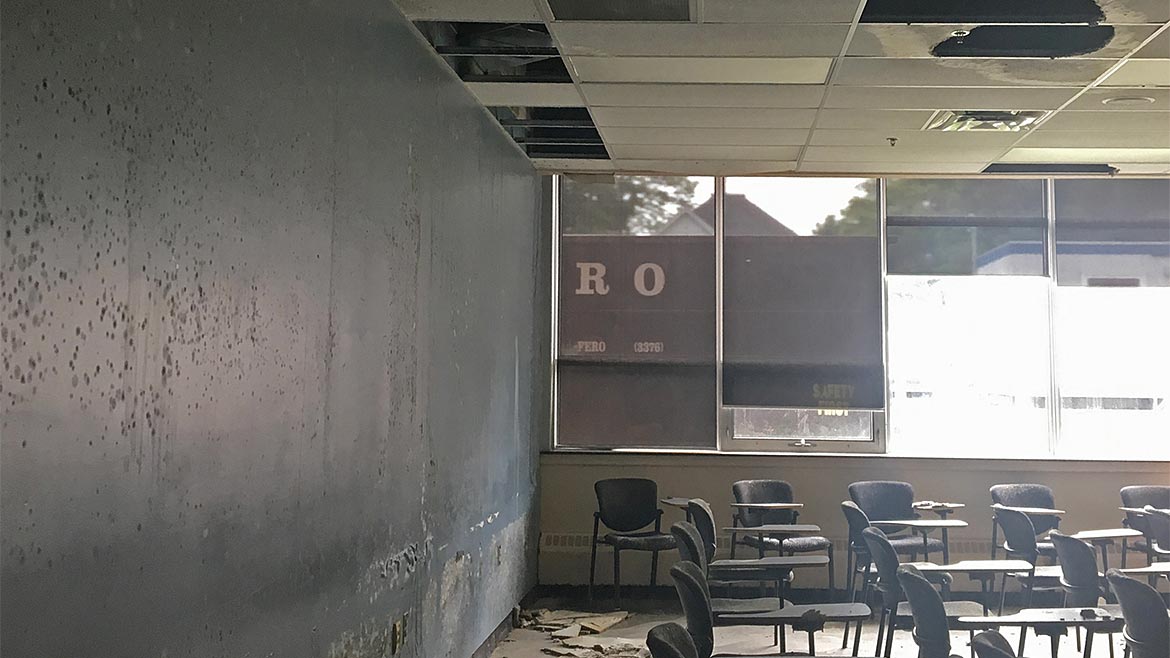 A building interior with extensive fire damage