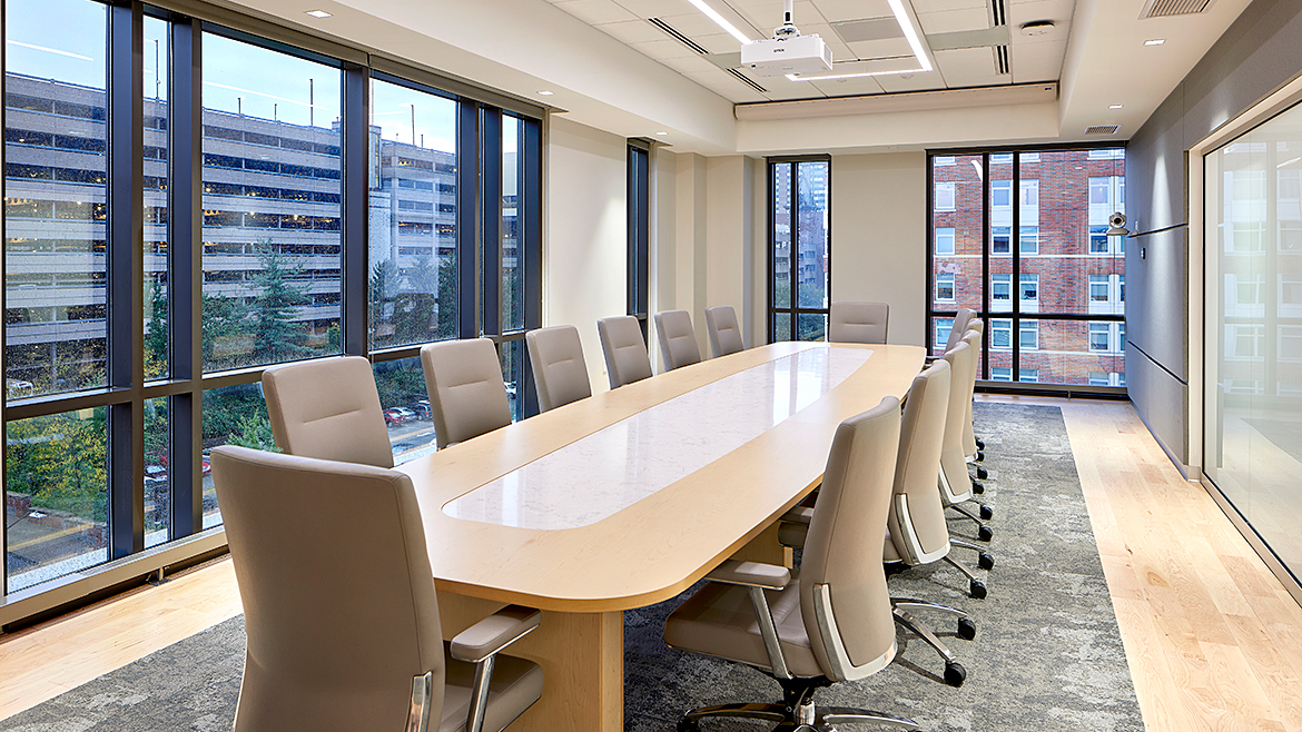 A long table in a meeting room